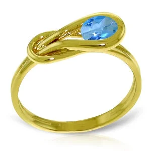 0.65 Carat 14K Solid Yellow Gold Lean Towards Me Blue Topaz Ring